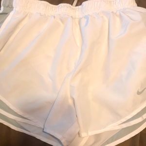 White Nike shorts